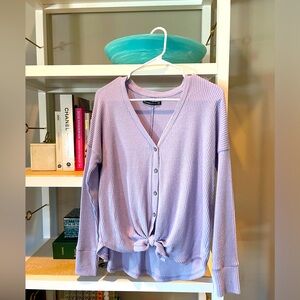 Purple tie, long sleeve Abercrombie shirt.